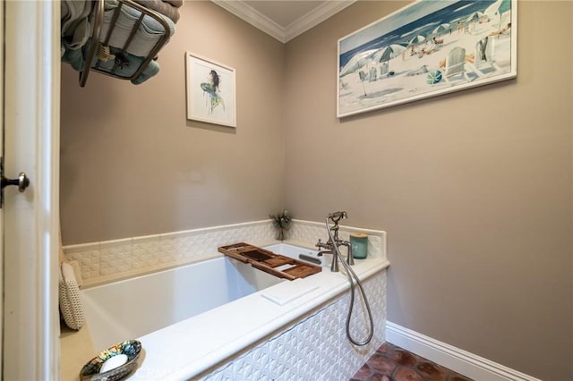 bathroom featuring crown molding, baseboards, and a bath