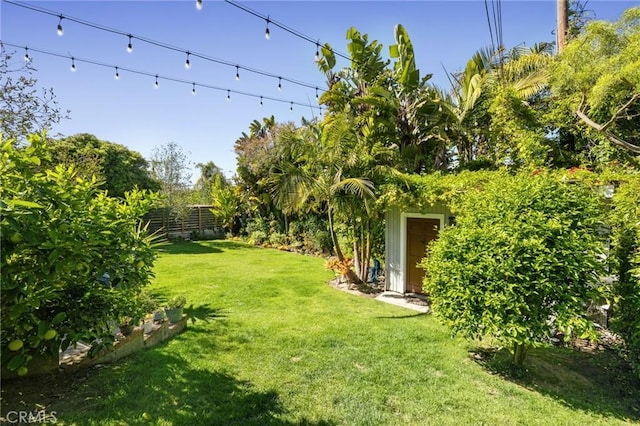 view of yard featuring fence
