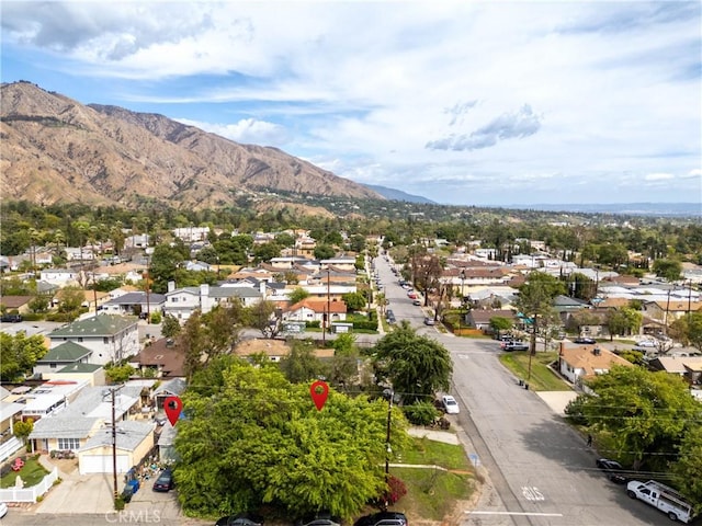 aerial view with a mountain view and a residential view