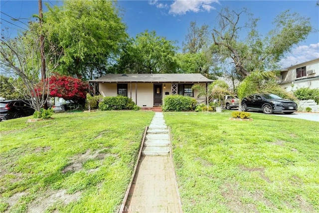bungalow with a front lawn