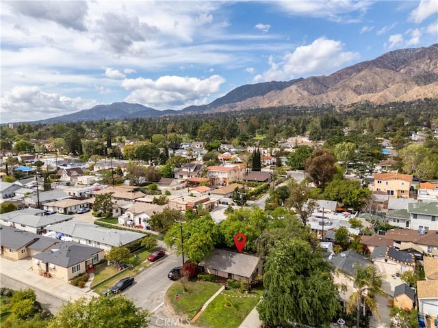 bird's eye view featuring a mountain view and a residential view