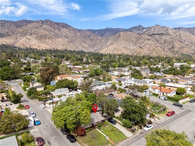drone / aerial view featuring a mountain view and a residential view