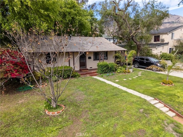 view of front of home with a front yard