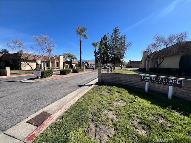 view of road with a residential view