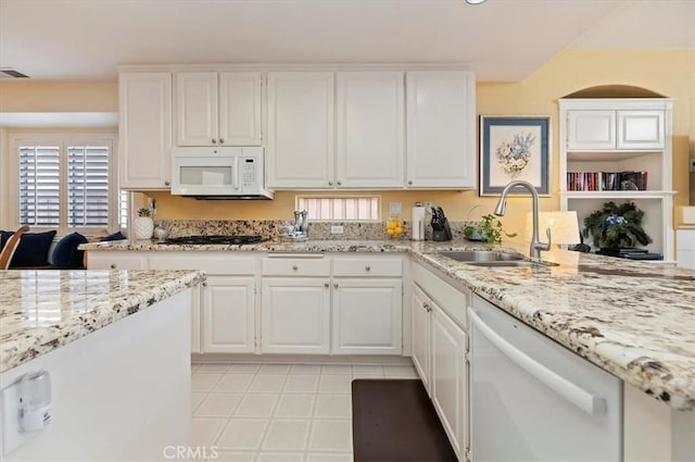 40636 Via Jalapa, Murrieta, CA 92562 - kitchen with white appliances, white cabinetry, a healthy amount of sunlight, and a sink