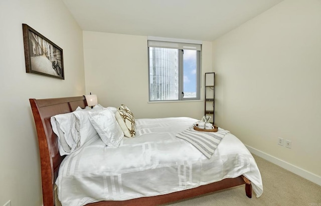700 W E St Unit 2802, San Diego, CA 92101 - bedroom featuring baseboards and carpet flooring