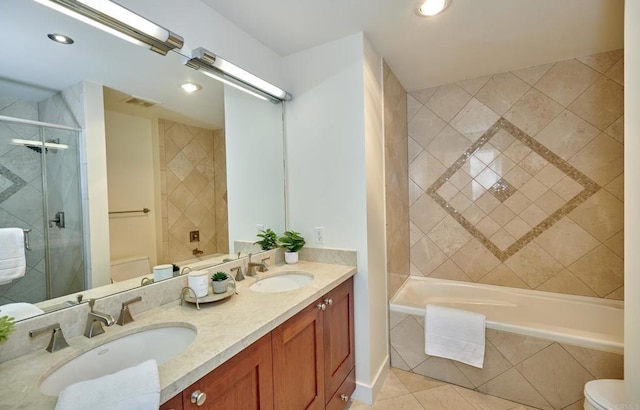 700 W E St Unit 2802, San Diego, CA 92101 - bathroom featuring toilet, recessed lighting, tile patterned flooring, double vanity, and tiled shower / bath