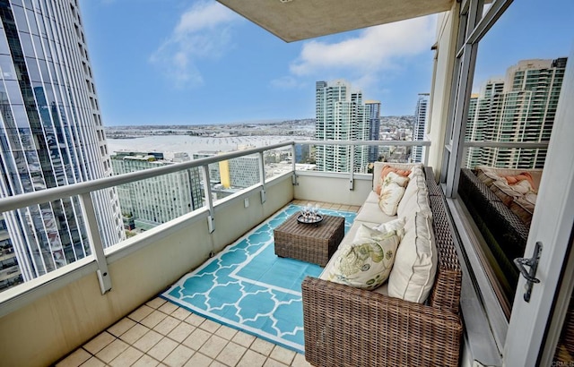 700 W E St Unit 2802, San Diego, CA 92101 - balcony featuring a city view and outdoor lounge area