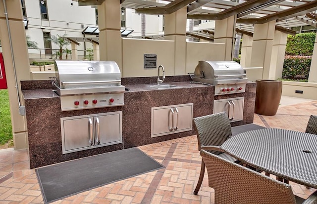 700 W E St Unit 2802, San Diego, CA 92101 - view of patio / terrace with a sink, grilling area, a pergola, and area for grilling