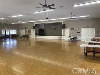 misc room with ceiling fan and wood finished floors