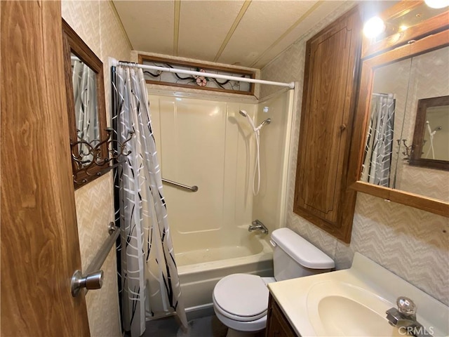 full bath featuring vanity, shower / bathtub combination with curtain, and toilet