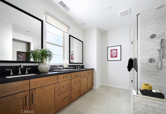 3816 Crossen Dr, Corona, CA 92883 - bathroom featuring double vanity, a shower stall, and baseboards