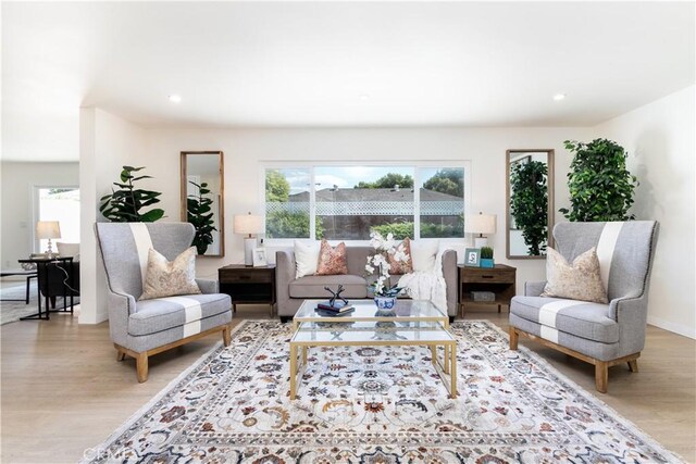 9038 Whitaker Ave, Northridge, CA 91343 - living room featuring plenty of natural light, light wood-style floors, and recessed lighting