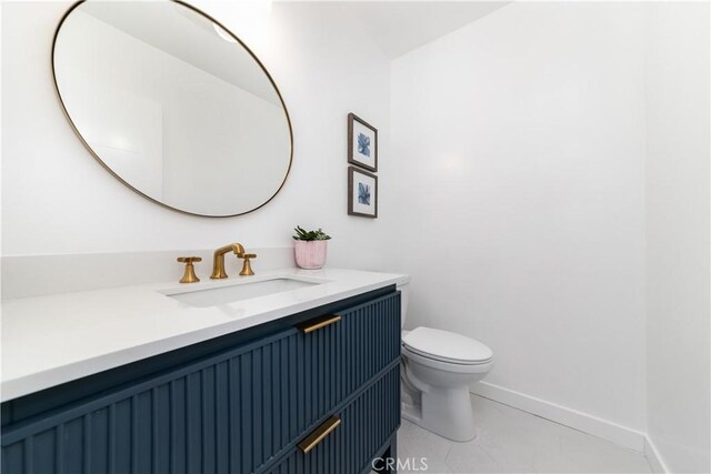9038 Whitaker Ave, Northridge, CA 91343 - half bath featuring vanity and toilet