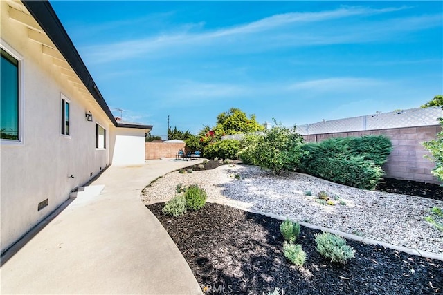 9038 Whitaker Ave, Northridge, CA 91343 - fenced backyard featuring a patio area