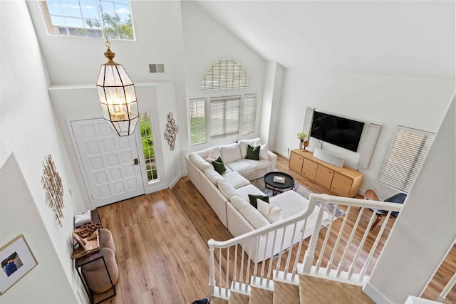 3702 Southridge Way, Oceanside, CA 92056 - foyer featuring a chandelier, high vaulted ceiling, wood finished floors, and baseboards