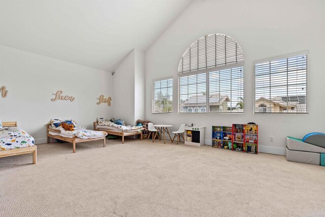 3702 Southridge Way, Oceanside, CA 92056 - recreation room with high vaulted ceiling, carpet floors, and baseboards