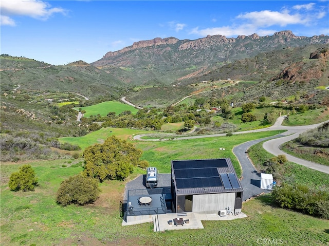 drone / aerial view with a mountain view