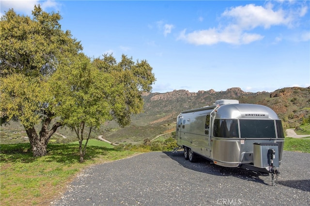 exterior space featuring a mountain view