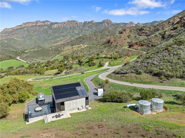 bird's eye view with a mountain view