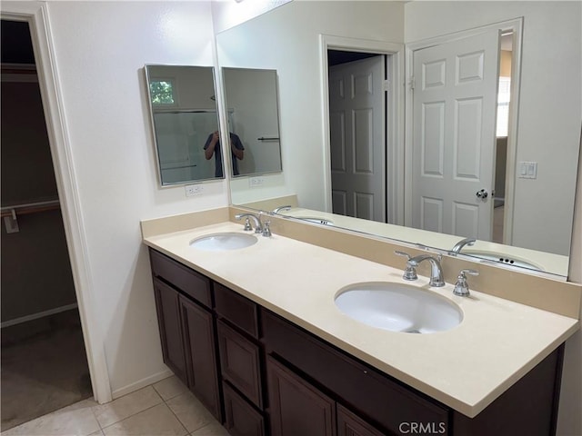 13312 Frederick Way, Sylmar, CA 91342 - bathroom with double vanity and tile patterned flooring