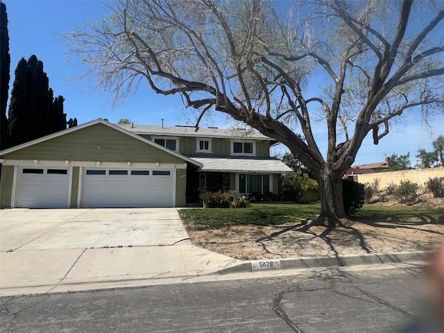 5829 Aurora Ave, Jurupa Valley, CA 91752 - traditional-style house featuring concrete driveway and an attached garage
