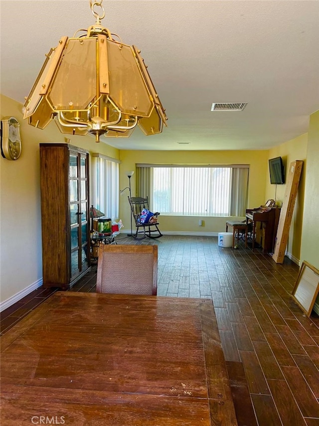 5829 Aurora Ave, Jurupa Valley, CA 91752 - interior space featuring a chandelier, wood finished floors, baseboards, and french doors