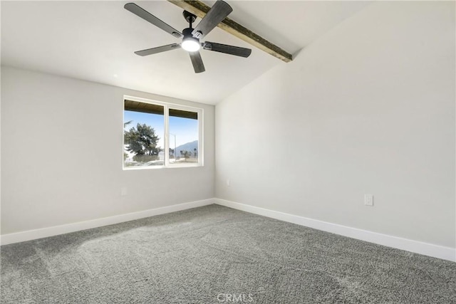 carpeted empty room featuring lofted ceiling with beams, ceiling fan, and baseboards
