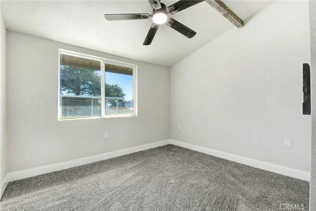 carpeted spare room featuring ceiling fan, baseboards, and lofted ceiling