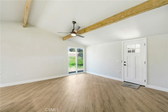 unfurnished living room featuring light wood finished floors, baseboards, vaulted ceiling with beams, and ceiling fan
