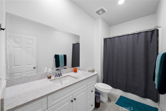 bathroom featuring vanity, toilet, tile patterned floors, visible vents, and curtained shower