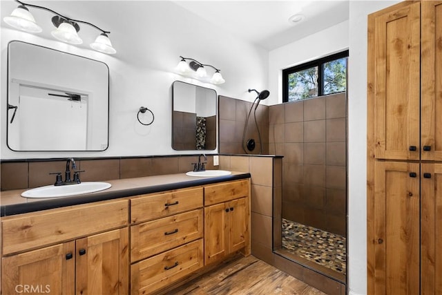 6010 Sunny Ln, Paradise, CA 95969 - full bathroom featuring a walk in shower, wood finished floors, and double vanity