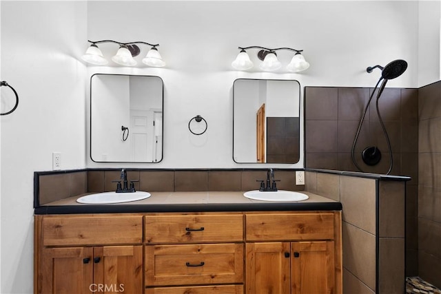 6010 Sunny Ln, Paradise, CA 95969 - bathroom featuring double vanity and tiled shower