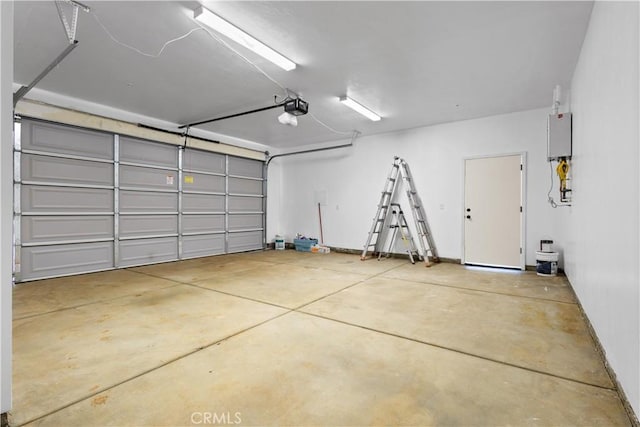 6010 Sunny Ln, Paradise, CA 95969 - garage with a garage door opener and baseboards