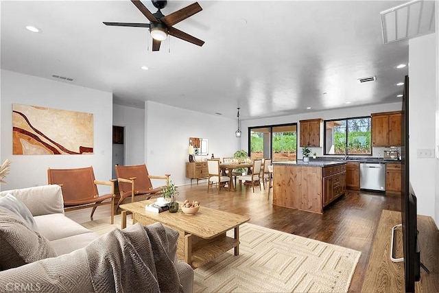 6010 Sunny Ln, Paradise, CA 95969 - living room with ceiling fan, recessed lighting, and dark wood-style flooring