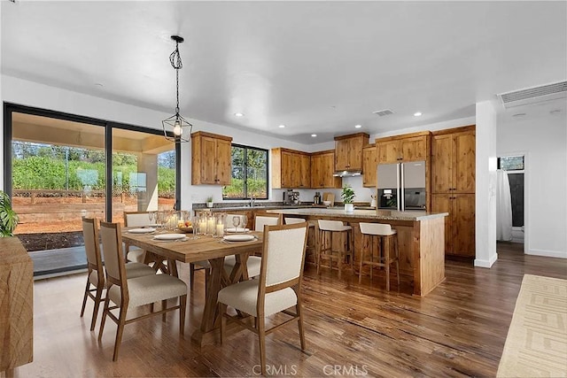 6010 Sunny Ln, Paradise, CA 95969 - dining area with dark wood-style flooring, recessed lighting, and baseboards