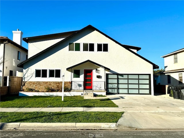 4609 Highgrove Ave, Torrance, CA 90505 - view of front of home featuring stucco siding, a garage, stone siding, concrete driveway, and fence