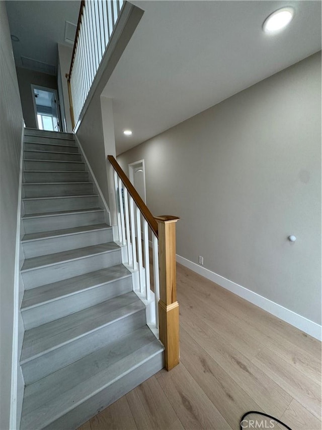 4609 Highgrove Ave, Torrance, CA 90505 - staircase with wood finished floors, baseboards, and recessed lighting