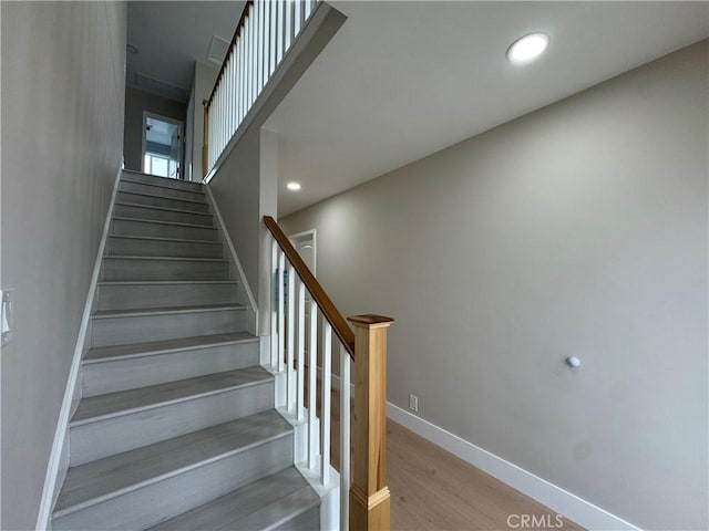 4609 Highgrove Ave, Torrance, CA 90505 - stairs featuring wood finished floors, baseboards, and recessed lighting
