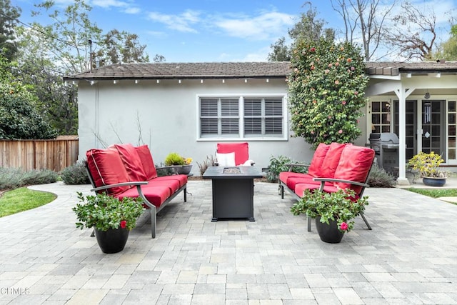 4402 El Camino Corto Ln, Canada Flintridge, CA 91011 - view of patio / terrace with fence and an outdoor living space with a fire pit