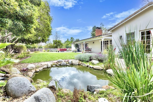 4402 El Camino Corto Ln, Canada Flintridge, CA 91011 - view of yard featuring a small pond and a patio