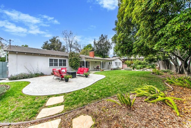 4402 El Camino Corto Ln, Canada Flintridge, CA 91011 - back of property featuring a patio area, stucco siding, an outdoor living space, and a chimney
