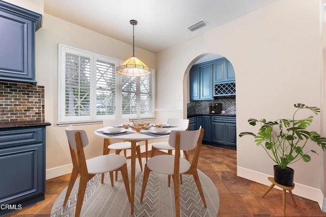 4402 El Camino Corto Ln, Canada Flintridge, CA 91011 - dining area with baseboards and arched walkways