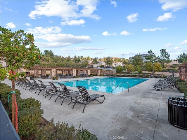community pool with a patio