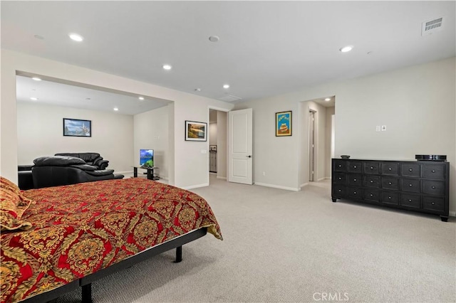 bedroom featuring visible vents, baseboards, recessed lighting, and carpet