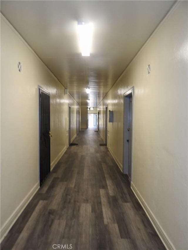 5510 Lexington Ave, Los Angeles, CA 90038 - hallway with baseboards and dark wood-style flooring