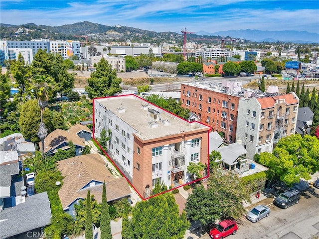 5617 La Mirada Ave, Los Angeles, CA 90038 - drone / aerial view with a mountain view