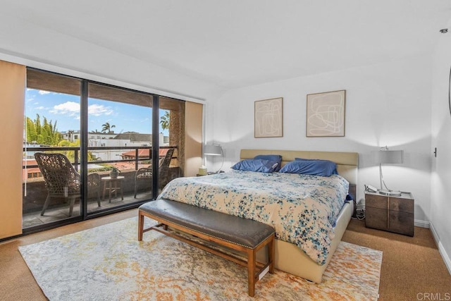 230 W Laurel St Unit 506, San Diego, CA 92101 - bedroom with access to exterior, carpet floors, and baseboards