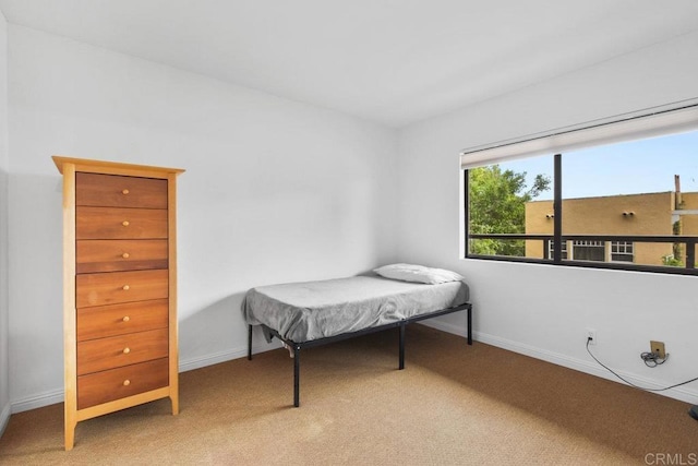 230 W Laurel St Unit 506, San Diego, CA 92101 - bedroom featuring light colored carpet and baseboards