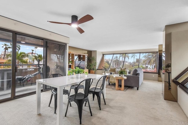 230 W Laurel St Unit 506, San Diego, CA 92101 - dining area featuring light carpet and a ceiling fan